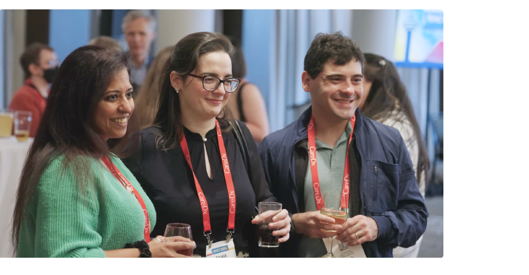 Photo of people smiling at a reception at ISHLT2026 in Toronto