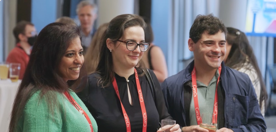 Photo of people smiling at a reception at ISHLT2026 in Toronto