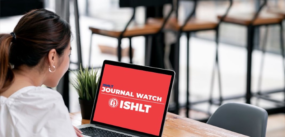 Woman looking at a computer screen that says ISHLT Journal Watch