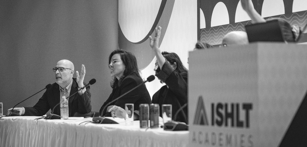 Black and white photo of people voting