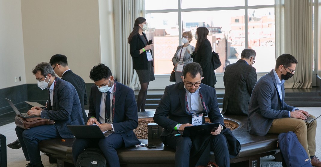 Attendees at an ISHLT event check in on their devices