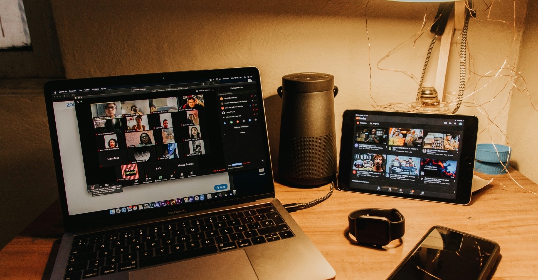 Photo of computer on zoom screen with participants