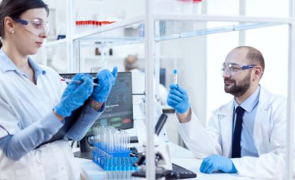 Photo of a man and a woman in a lab