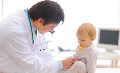 Photo of a doctor with a baby
