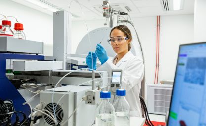 Photo of woman in a medical lab doing research