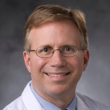 Headshot of John Reynolds