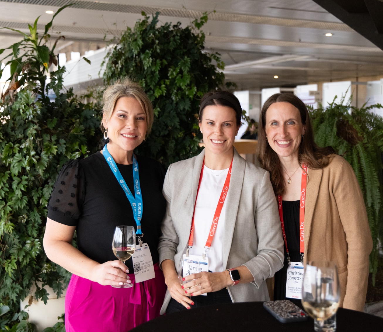 Photo of three people smiling