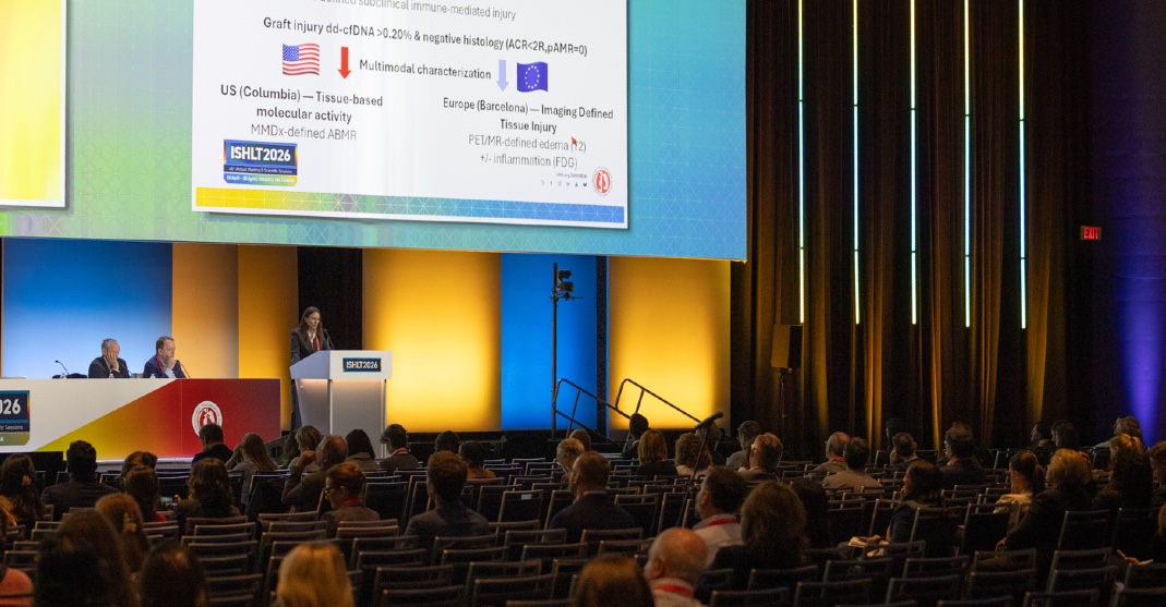 Photo of a woman presenting on stage at ISHLT2026