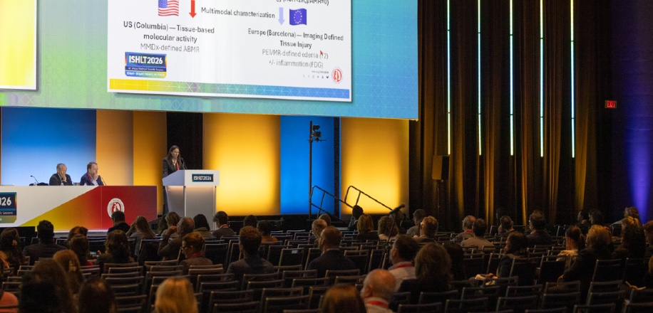 Photo of a woman presenting on stage at ISHLT2026