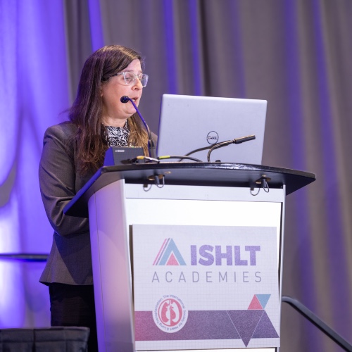 woman presenting at a 2026 Preconference Day Academy Course