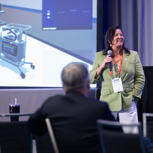 woman presenting in front of a screen at ISHLT2026 Preconference Day