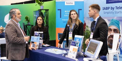Man interacting with exhibitors in the ISHLT2025 Exhibit Hall
